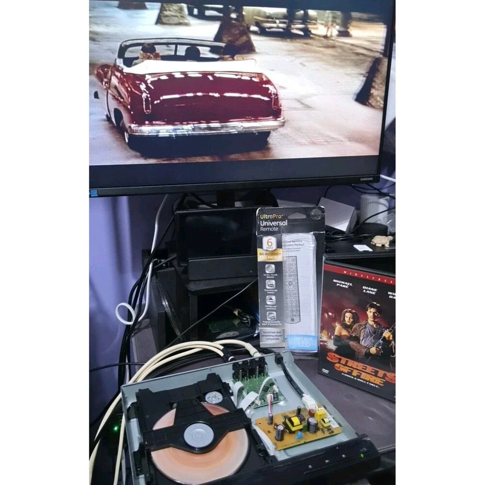 Sony DVP-SR210P DVD Player Bundle with Remote - Streets of Fire, Wild Hogs DVDs